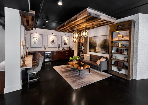 the interior of a living room with a couch and a table